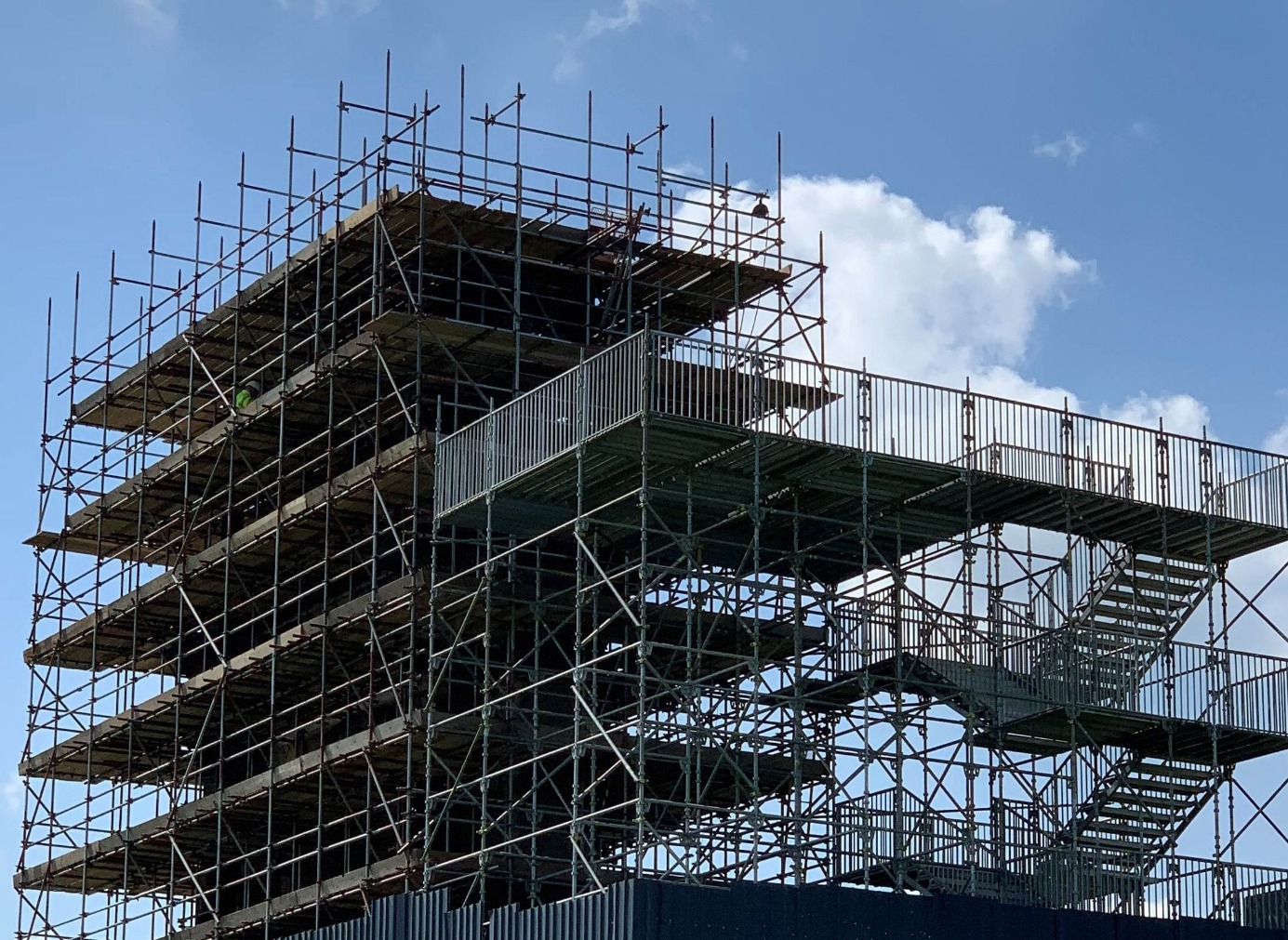 Temporary roofing scaffold structure on a building project Temporary roofing scaffold structure on a building project